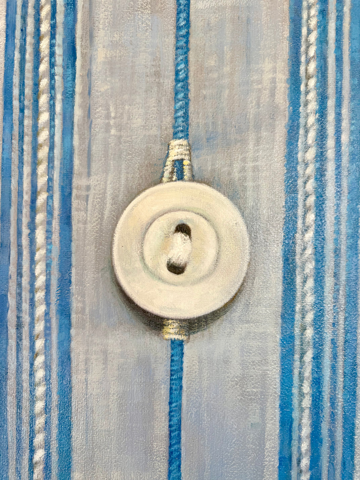 Detail of a painted shirt placket and button, oil on canvas
